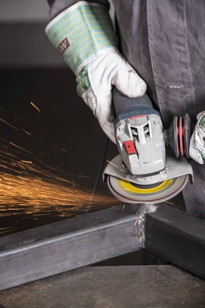 Klingspor abrasive mop disc grinding steel — representative manufacturer application photo